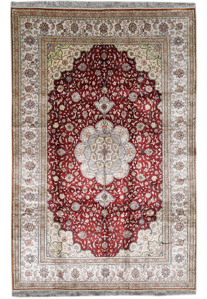 Handmade Silk Tabriz Area Rug 5.9 x 8.9 Ruby Red Ivory Green: Handmade Silk Tabriz Area Rug 5.9 x 8.9 Ruby Red Ivory Green Free continental US Shipping This handmade area rug is crafted from premium silk and features a Tabriz pattern with ruby red, ivory, and gr