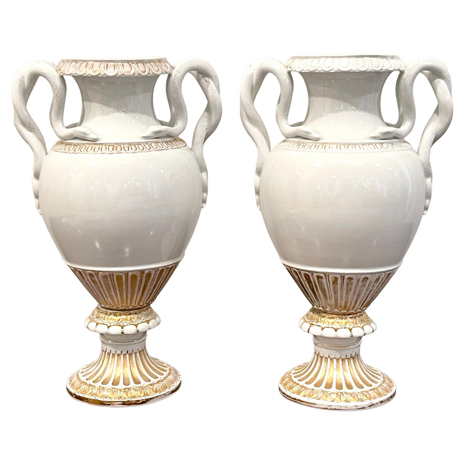 19th Century Meissen Neoclassical Serpent Handled Vases Set of 2: 19th Century Meissen Neoclassical Serpent Handled Vases Set of 2 This exquisite pair of 19th Century Meissen gold and white neoclassical serpent handled vases showcases timeless elegance and craftsman