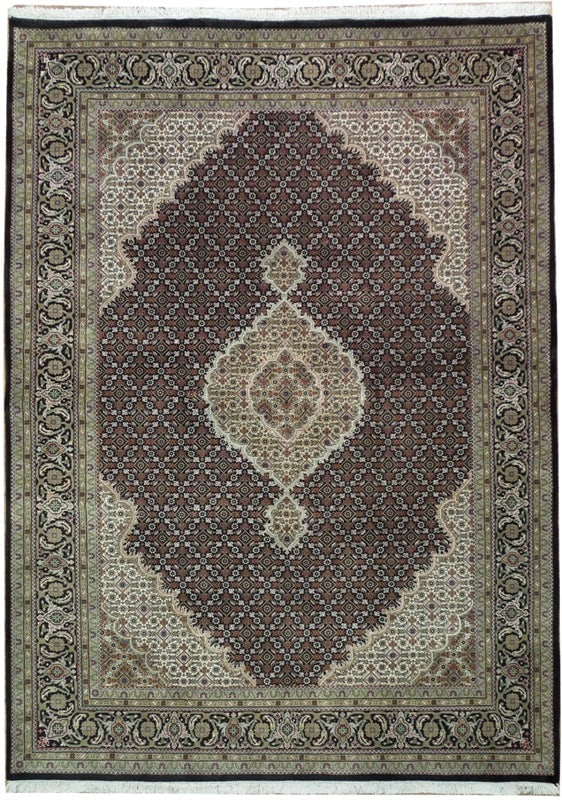 5.9 x 8 Handmade Black Mahi Tabriz Wool Silk Persian Rug: 5.9 x 8 Handmade Black Mahi Tabriz Wool Silk Persian Rug Free continental US Shipping This handmade rug is crafted in Iran using fine wool and silk, showcasing the traditional Mahi Tabriz design. The 