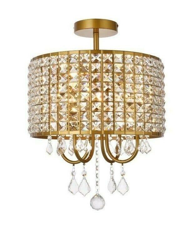 Living District Elise 4-Light Brass Crystal Flush Mount 14 Inch: Living District Elise 4-Light Brass Crystal Flush Mount 14 Inch This modern flush mount chandelier features a brass finish and is adorned with royal cut clear crystals, creating an elegant lighting so