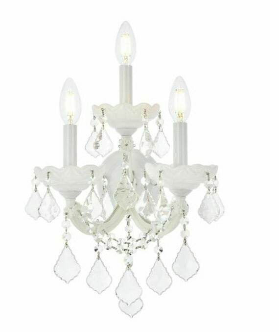 Maria Theresa 3 Light Crystal Wall Sconce White Chrome 22 Inch: Maria Theresa 3 Light Crystal Wall Sconce White Chrome 22 Inch This Maria Theresa wall sconce features a sophisticated design with clear royal cut crystals and a white finish accented by chrome (silve