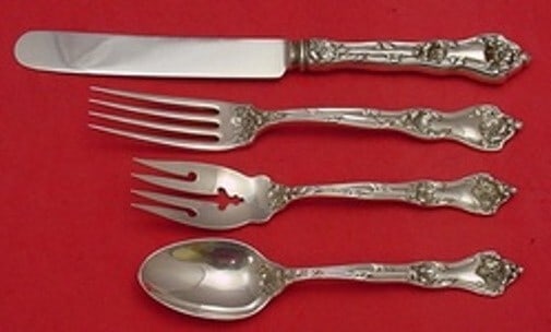 Reed and Barton Intaglio Sterling Silver 4-Pc Place Setting: Reed and Barton Intaglio Sterling Silver 4-Pc Place Setting This exquisite 4-piece place setting by Reed and Barton showcases the elegant Intaglio pattern, crafted from high-quality sterling silver. T