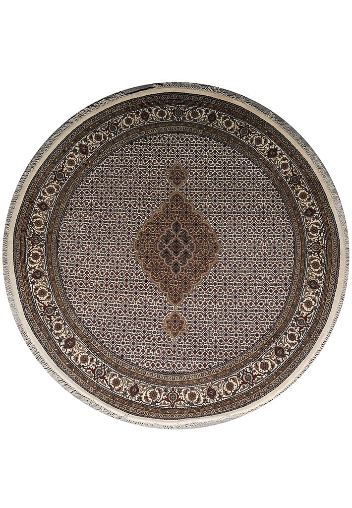6.8 x 6.8 Round Wool and Silk Mahi Tabriz Handmade Rug: 6.8 x 6.8 Round Wool and Silk Mahi Tabriz Handmade Rug Free continental US Shipping This 6.8 x 6.8 round handmade rug features the classic Mahi Tabriz pattern, crafted with a fine blend of wool and si