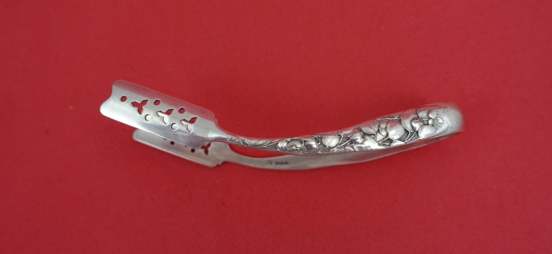 Sterling Silver Asparagus Tong Berry Pattern by Whiting 4 1/8 Inch: Sterling Silver Asparagus Tong Berry Pattern by Whiting 4 1/8 Inch This is a sterling silver individual asparagus tong in the Berry pattern by Whiting. Featuring a multi-motif design, this serving pie