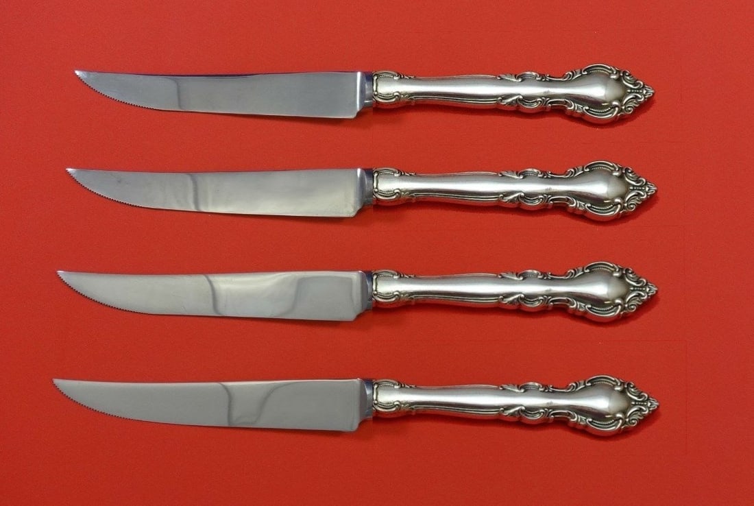 Lunt Malvern Sterling Silver Steak Knife Set 4pc Custom Made 8.5": Lunt Malvern Sterling Silver Steak Knife Set 4pc Custom Made 8.5" Enhance your dining experience with this exquisite 4-piece steak knife set from Lunt in the Malvern pattern. Each knife features a ste