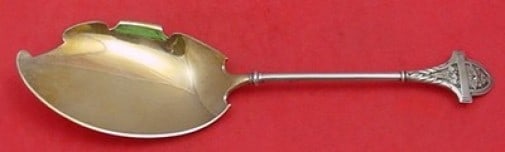 Gorham Ivy Sterling Silver Gold Washed Ice Cream Server 10": Gorham Ivy Sterling Silver Gold Washed Ice Cream Server 10" Serve your favorite desserts in style with this Ivy by Gorham Sterling Silver Ice Cream Server. This exquisite piece features a gold-washed 