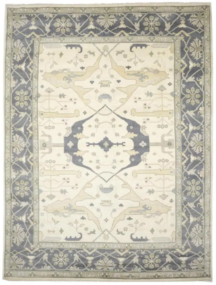 Hand-Knotted Wool Oushak Floral Area Rug 10 x 13'11: Hand-Knotted Wool Oushak Floral Area Rug 10 x 13'11 This handmade extra large Oushak Oriental rug features a floral pattern in muted tones of cream, taupe, tan, and light olive. Expertly hand-knotted 