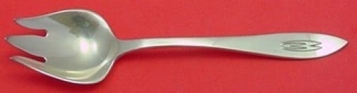 Shreve Buckingham Narrow Sterling Silver Ice Cream Fork 5 1/4": Shreve Buckingham Narrow Sterling Silver Ice Cream Fork 5 1/4" Indulge in a touch of elegance with this Buckingham Narrow Ice Cream Fork by Shreve. Crafted from high-quality sterling silver, this exqu
