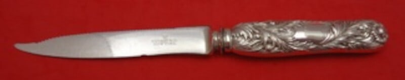 Tiffany Co Chrysanthemum Sterling Silver Fruit Knife Serrated Silverplated Blade: Tiffany Co Chrysanthemum Sterling Silver Fruit Knife Serrated Silverplated Blade A Chrysanthemum pattern fruit knife by Tiffany & Co., made with a sterling silver handle and a silver-plated serrated b