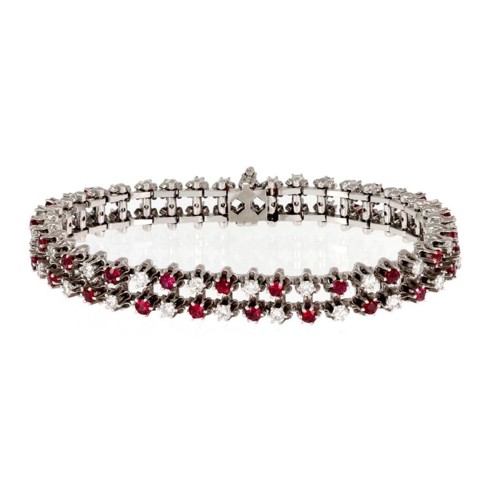Elegant 14k White Gold Double Row Diamond Ruby Tennis Bracelet: Elegant 14k White Gold Double Row Diamond Ruby Tennis Bracelet This stunning double row tennis bracelet showcases a beautiful combination of round cut diamonds and rubies, meticulously crafted from 14