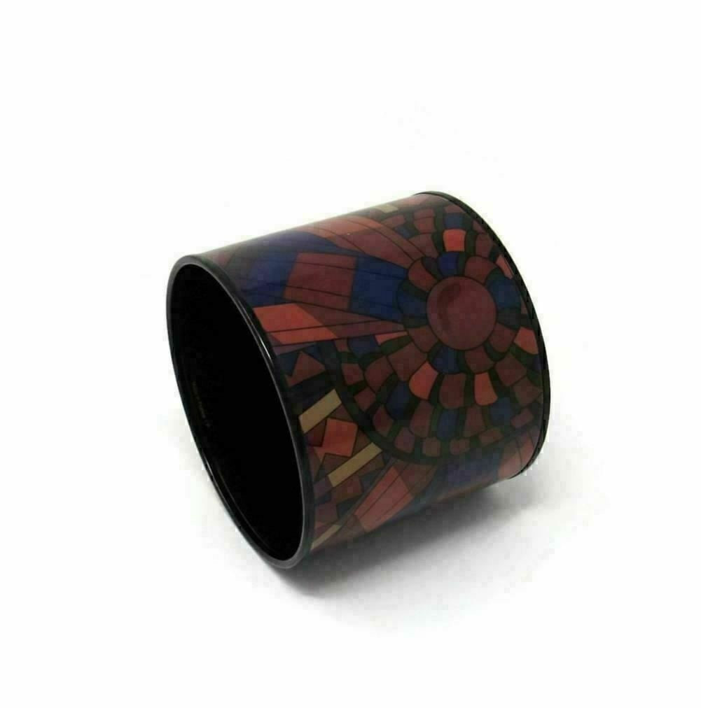Hermes Rubans de Cheval extra wide enamel bangle in black PVD steel: Hermes Rubans de Cheval extra wide enamel bangle in black PVD steel Pre-owned Hermes Rubans de Cheval extra-wide enamel bangle bracelet featuring an abstract mosaic-inspired multicolor design. Crafted