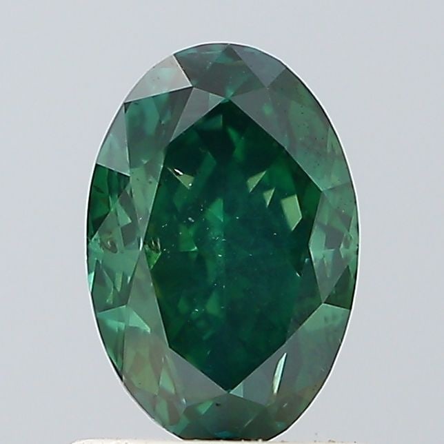 Loose Diamond - OVAL 1.03ct Fancy Green SI2: Loose Diamond - OVAL 1.03ct Fancy Green SI2 Source: Natural Shape: OVAL Carats: 1.03 Color: Fancy Green Certification: NONE PLEASE NOTE: Framed, Large, or heavy items do not have shipping costs includ