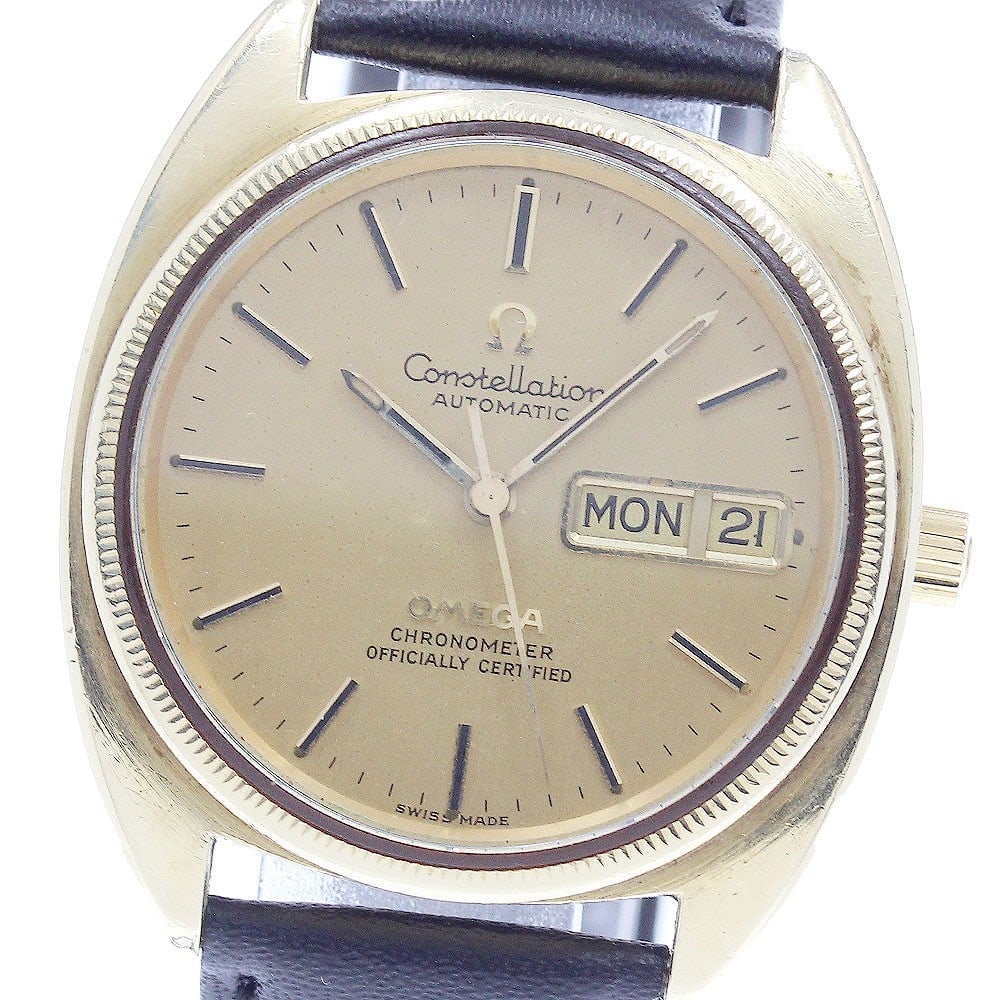 Omega Constellation Automatic Day-Date Men's Watch CD168.0057: Omega Constellation Automatic Day-Date Men's Watch CD168.0057 This pre-owned OMEGA Constellation men's wristwatch features a gold-tone dial and a yellow gold bezel. The stainless steel, gold-plated, a