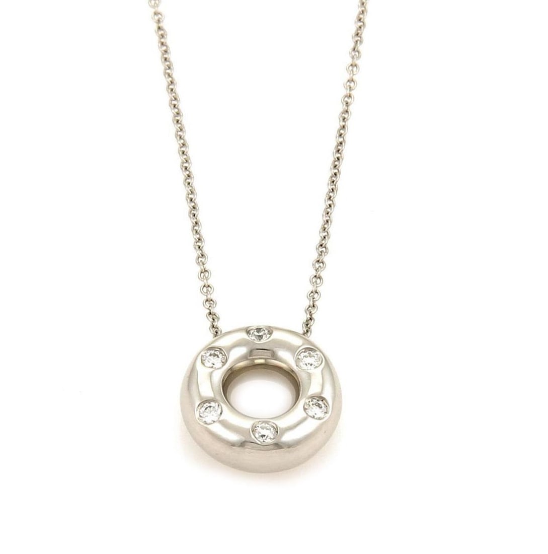 Tiffany & Co. Etoile Pendant Necklace Platinum Diamonds 13mm: Tiffany & Co. Etoile Pendant Necklace Platinum Diamonds 13mm Discover elegance with this authentic Tiffany & Co. Etoile Circle Pendant Diamond Platinum Necklace. Meticulously crafted from platinum, th