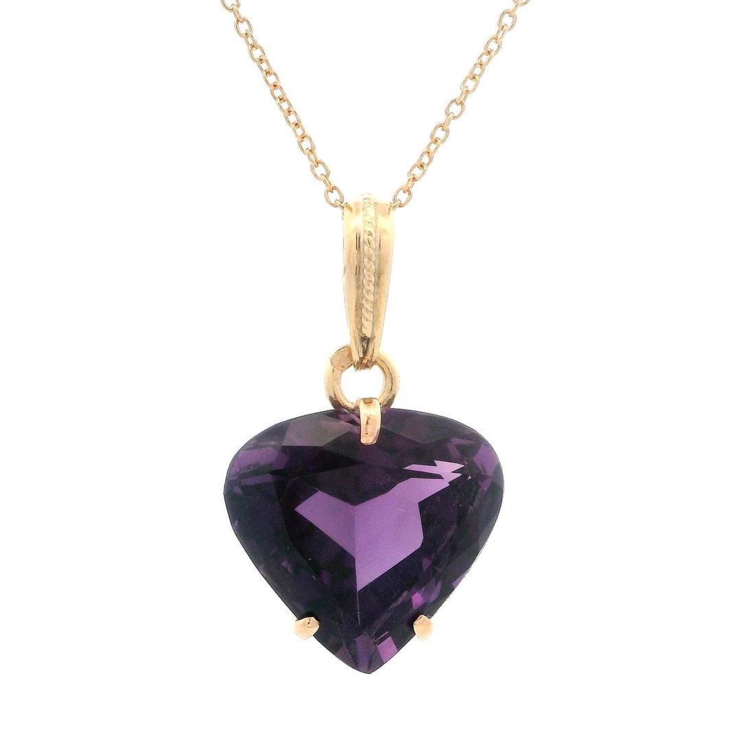 Vintage 14k Rosy Yellow Gold Heart Amethyst Pendant Necklace 18in: Vintage 14k Rosy Yellow Gold Heart Amethyst Pendant Necklace 18in This elegant vintage pendant features a stunning heart cut amethyst, beautifully prong set in solid 14k rosy yellow gold. The amethyst