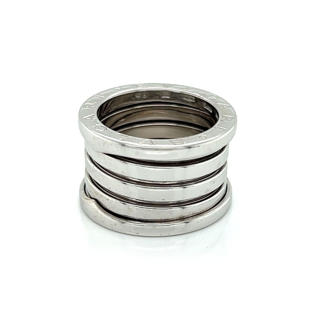 Bvlgari B.zero1 18k White Gold Five Band Ring US 4.5 EU 49: Bvlgari B.zero1 18k White Gold Five Band Ring US 4.5 EU 49 Authentic Bvlgari B.zero1 Five-Band ring crafted in solid 18k white gold. This iconic design features a bold spiral construction with a movab