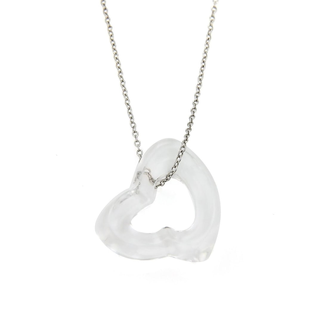 Tiffany & Co Elsa Peretti Open Heart Platinum Rock Crystal Necklace: Tiffany & Co Elsa Peretti Open Heart Platinum Rock Crystal Necklace Signed Tiffany & Co. Elsa Peretti Open Heart pendant necklace featuring natural clear rock crystal in the iconic sculptural motif. C