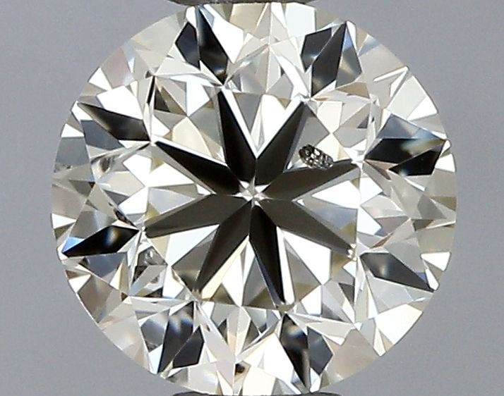Loose Diamond - ROUND 0.4ct O-P SI2: Loose Diamond - ROUND 0.4ct O-P SI2 Source: Natural Shape: ROUND Carats: 0.4 Color: O-P Certification: GIA Video: