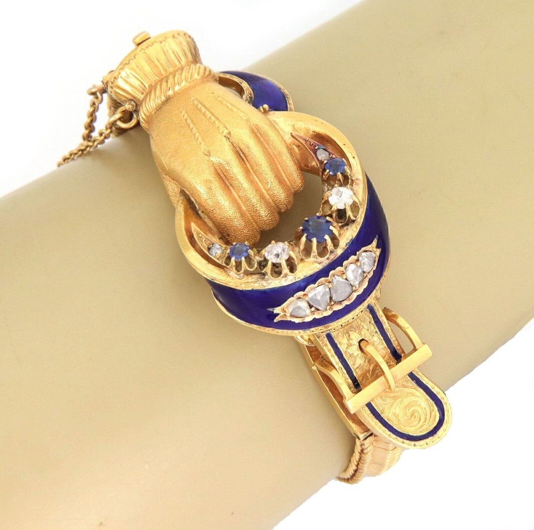 Vintage 21k Yellow Gold Hand Buckle Bangle with Rose Cut Diamonds Sapphire Enamel: Vintage 21k Yellow Gold Hand Buckle Bangle with Rose Cut Diamonds Sapphire Enamel Vintage estate bracelet with a hand belt buckle motif, crafted in 21k yellow gold and accented with enamel detailing, 