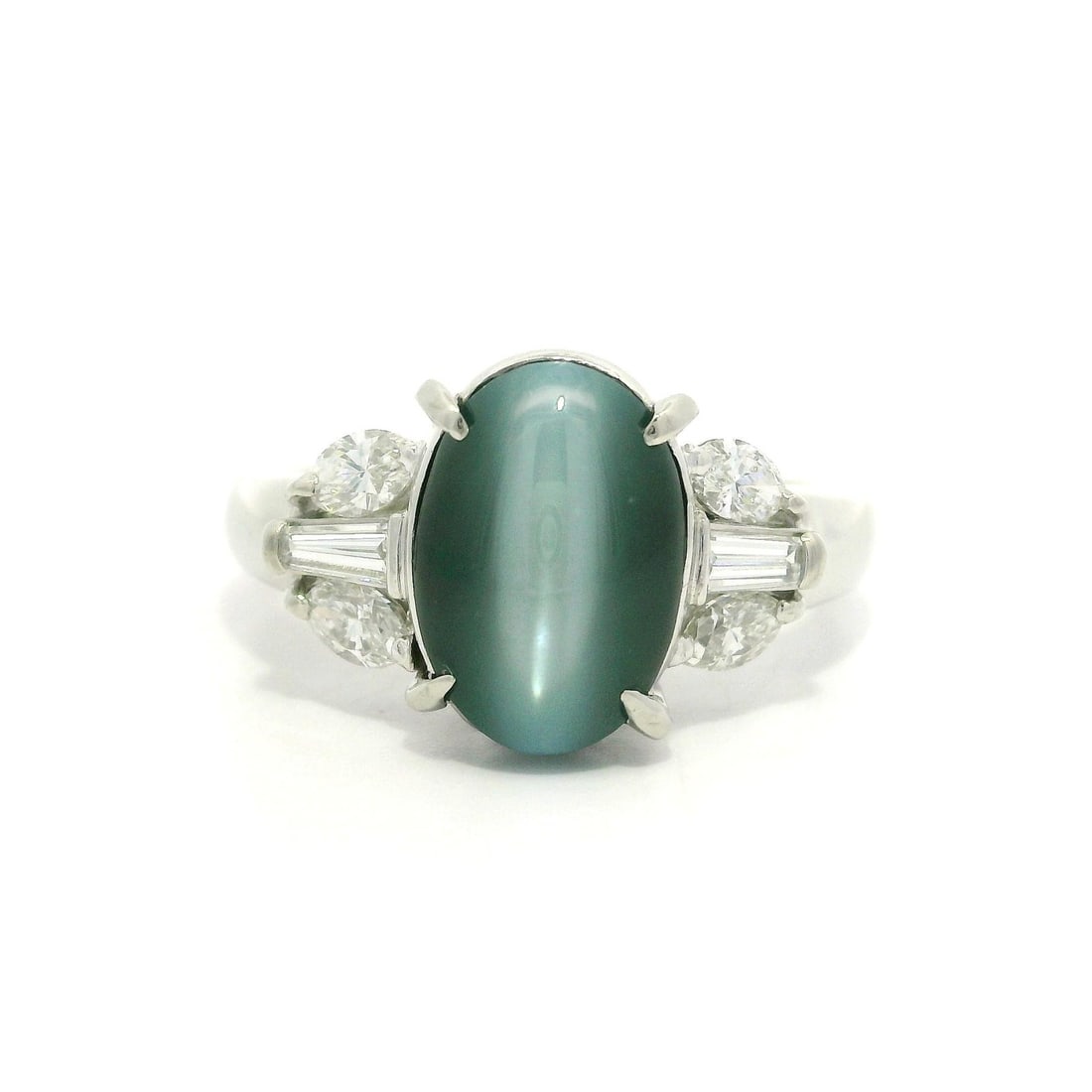 Platinum 5.1ctw Grayish Green Cat's Eye Diamond Cocktail Ring: Platinum 5.1ctw Grayish Green Cat's Eye Diamond Cocktail Ring This stunning cocktail ring features a unique oval grayish green cat's eye gemstone at its center, measuring 10.5x7.3mm and weighing 4.55c