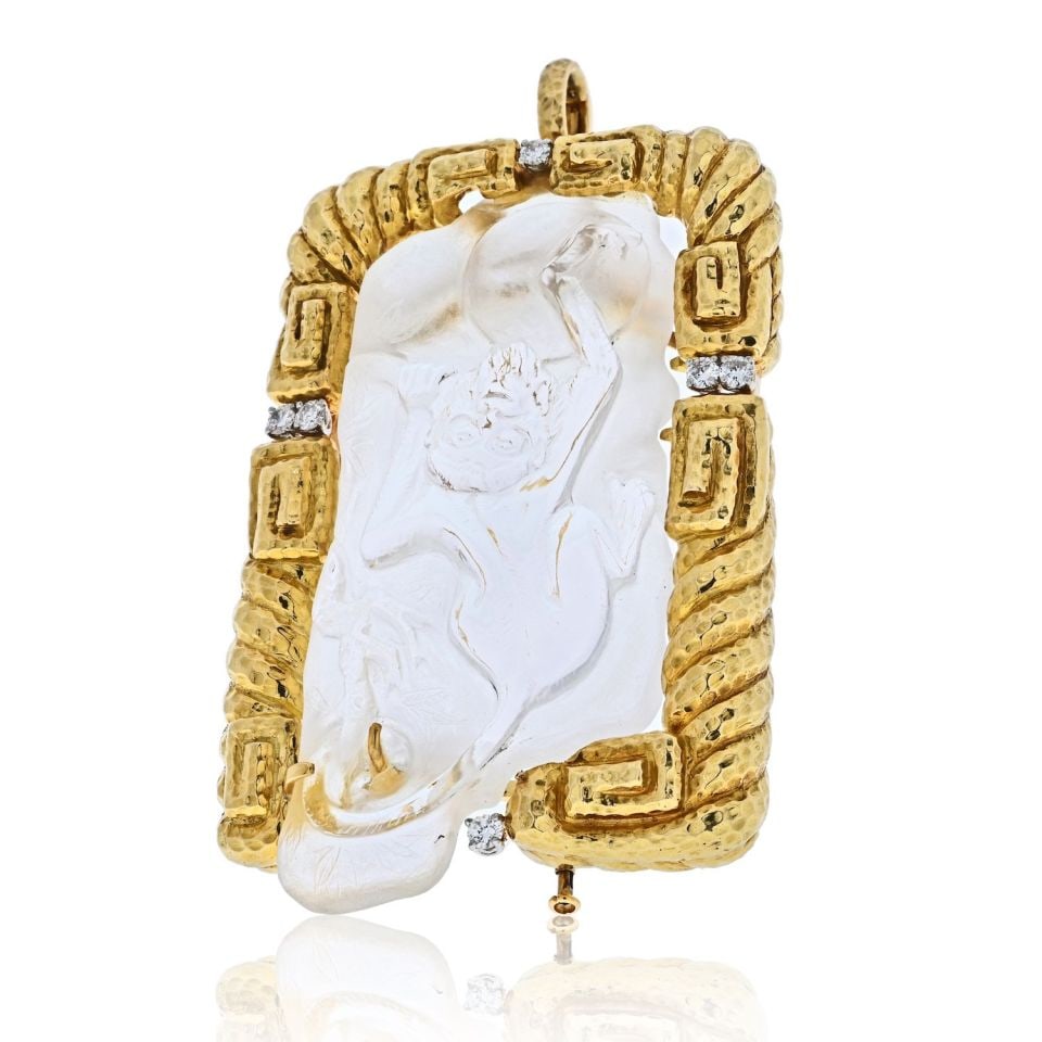 David Webb 18K Yellow Gold Rock Crystal Monkey Pendant with Diamonds: David Webb 18K Yellow Gold Rock Crystal Monkey Pendant with Diamonds This exquisite David Webb pendant features a beautifully carved monkey in rock crystal, accented with round brilliant-cut diamonds 