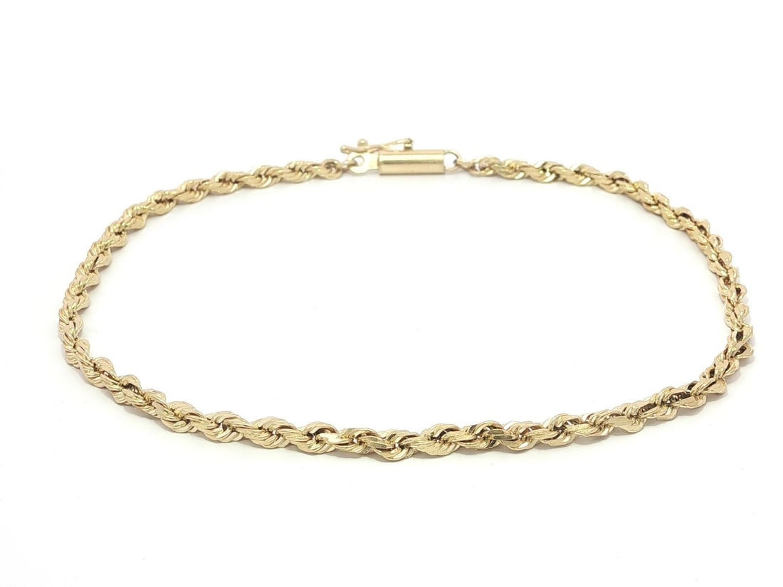 14k Yellow Gold Rope Link Bracelet 8 Inch Barrel Clasp Safety Latch: 14k Yellow Gold Rope Link Bracelet 8 Inch Barrel Clasp Safety Latch This exquisite Classic 14k Yellow Gold Rope Chain Link Bracelet features a secure barrel clasp with a safety latch, ensuring both st