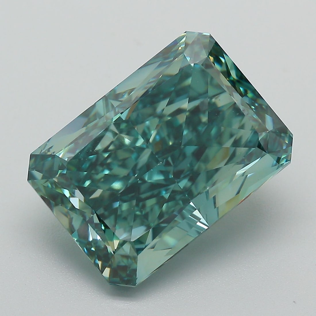 Loose Diamond - RADIANT 10.5ct Fancy Vivid Green VS1: Loose Diamond - RADIANT 10.5ct Fancy Vivid Green VS1 Source: This is a real non-mined Diamond that has been grown in a lab Shape: RADIANT Carats: 10.5 Color: Fancy Vivid Green Certification: IGI Video