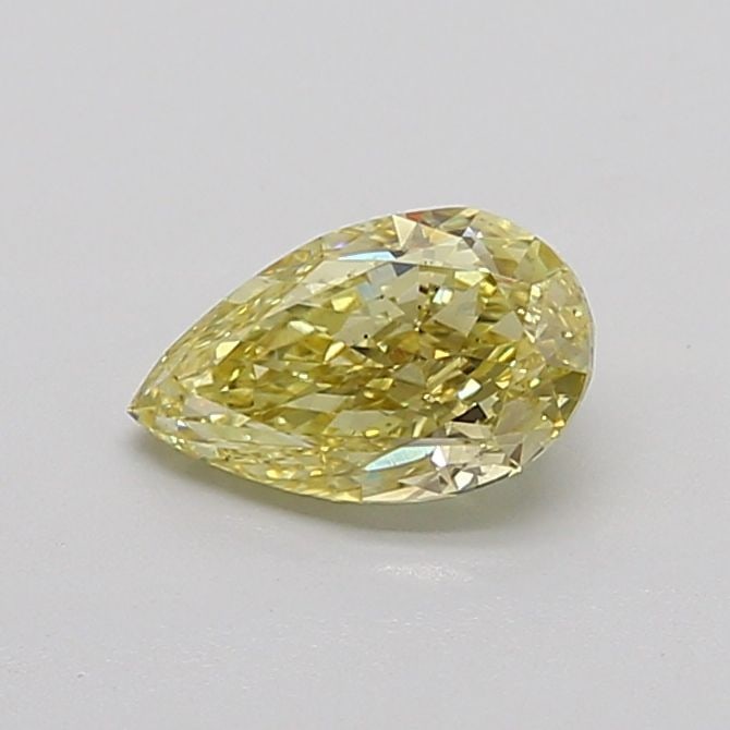 Loose Diamond - PEAR 1.07ct Fancy Vivid Yellow VS2: Loose Diamond - PEAR 1.07ct Fancy Vivid Yellow VS2 Source: This is a real non-mined Diamond that has been grown in a lab Shape: PEAR Carats: 1.07 Color: Fancy Vivid Yellow Certification: IGI Video:
