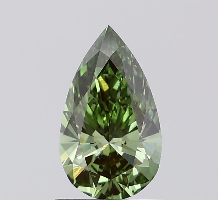 Loose Diamond - PEAR 0.98ct Fancy Vivid Green VS2: Loose Diamond - PEAR 0.98ct Fancy Vivid Green VS2 Source: This is a real non-mined Diamond that has been grown in a lab Shape: PEAR Carats: 0.98 Color: Fancy Vivid Green Certification: IGI Video:
