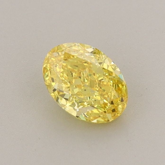 Loose Diamond - OVAL 0.55ct Fancy Vivid Yellow VS1: Loose Diamond - OVAL 0.55ct Fancy Vivid Yellow VS1 Source: This is a real non-mined Diamond that has been grown in a lab Shape: OVAL Carats: 0.55 Color: Fancy Vivid Yellow Certification: IGI Video:
