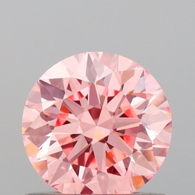 Loose Diamond - ROUND 0.65ct Fancy Vivid Pink VS1: Loose Diamond - ROUND 0.65ct Fancy Vivid Pink VS1 Source: This is a real non-mined Diamond that has been grown in a lab Shape: ROUND Carats: 0.65 Color: Fancy Vivid Pink Certification: IGI Video: