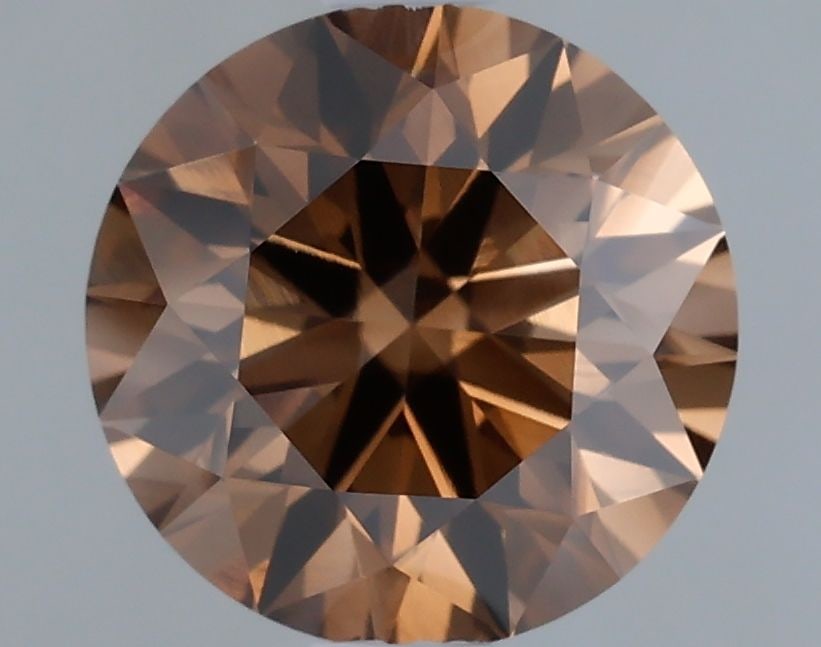 Ideal Loose Diamond - ROUND 1.08ct Fancy Brown VS1: Ideal Loose Diamond - ROUND 1.08ct Fancy Brown VS1 Source: This is a real non-mined Diamond that has been grown in a lab Shape: ROUND Carats: 1.08 Color: Fancy Brown Certification: IGI Video: