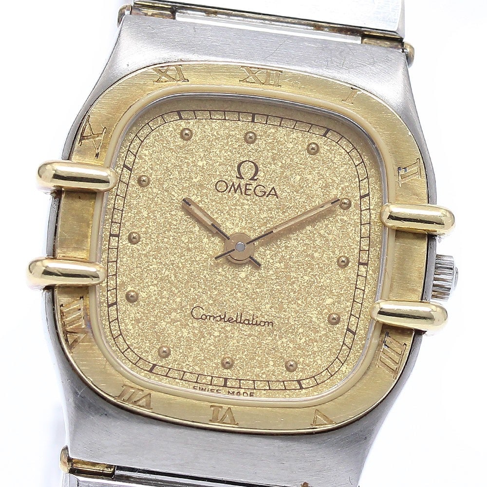 OMEGA Constellation Gold Dial Quartz Ladies Wristwatch: OMEGA Constellation Gold Dial Quartz Ladies Wristwatch This OMEGA Constellation Quartz women's wristwatch features a stainless steel and yellow gold case and bracelet with a gold dial. The watch is po
