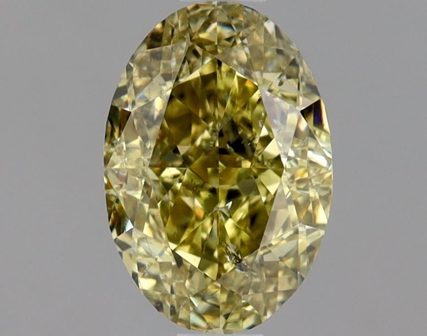 Loose Diamond - OVAL 1.01ct Fancy Brownish Greenish Yellow I1: Loose Diamond - OVAL 1.01ct Fancy Brownish Greenish Yellow I1 Source: Natural Shape: OVAL Carats: 1.01 Color: Fancy Brownish Greenish Yellow Certification: GIA Video: