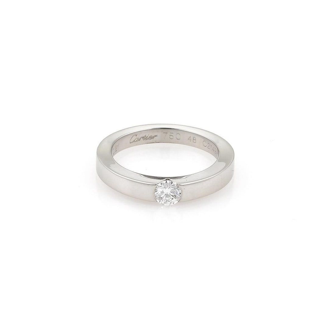 Cartier 18k White Gold Band Ring with 21 Point Diamond Size 48-US 4.5: Cartier 18k White Gold Band Ring with 21 Point Diamond Size 48-US 4.5 This exquisite band ring by Cartier is a testament to fine craftsmanship, made from 18k white gold with a high polished finish. Th