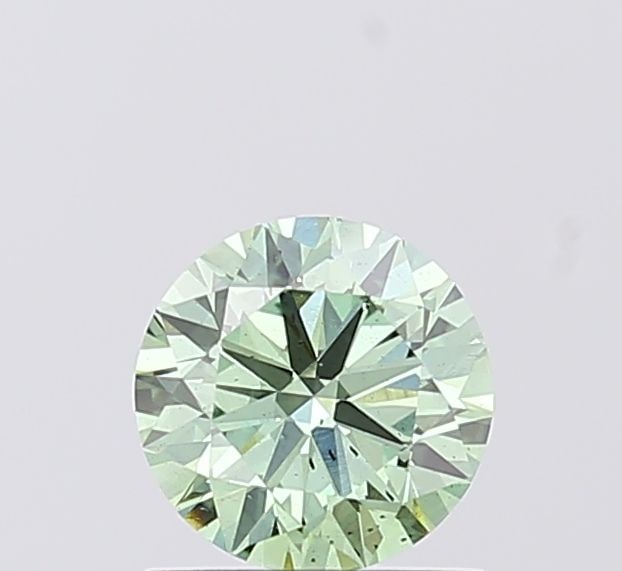 Loose Diamond - ROUND 0.89ct Fancy Vivid Green SI1: Loose Diamond - ROUND 0.89ct Fancy Vivid Green SI1 Source: This is a real non-mined Diamond that has been grown in a lab Shape: ROUND Carats: 0.89 Color: Fancy Vivid Green Certification: IGI Video: