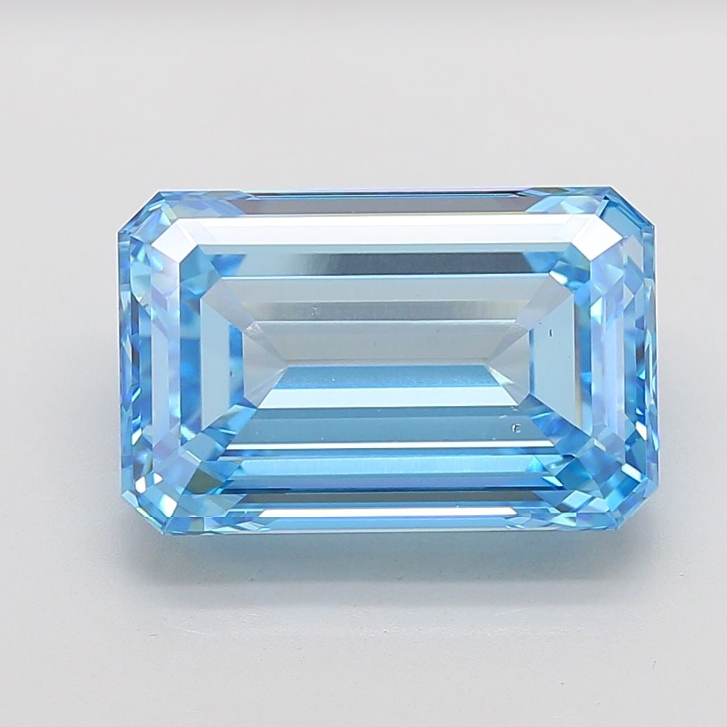 Loose Diamond - EMERALD 15.04ct Fancy Vivid Blue VS1: Loose Diamond - EMERALD 15.04ct Fancy Vivid Blue VS1 Source: This is a real non-mined Diamond that has been grown in a lab Shape: EMERALD Carats: 15.04 Color: Fancy Vivid Blue Certification: IGI Video