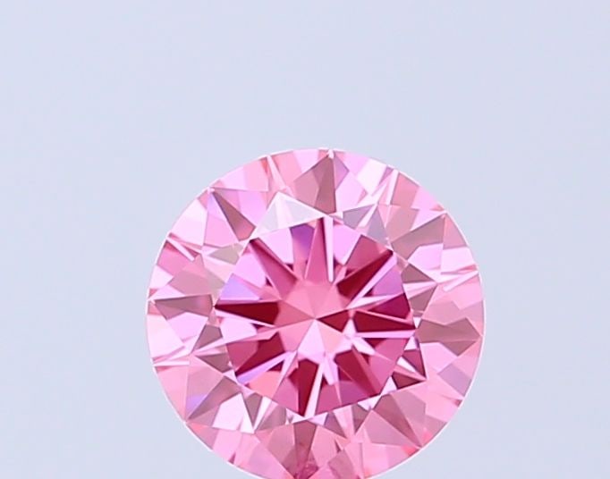 Loose Diamond - ROUND 1.0ct Fancy Vivid Pink VVS2: Loose Diamond - ROUND 1.0ct Fancy Vivid Pink VVS2 Source: This is a real non-mined Diamond that has been grown in a lab Shape: ROUND Carats: 1.0 Color: Fancy Vivid Pink Certification: IGI Video:
