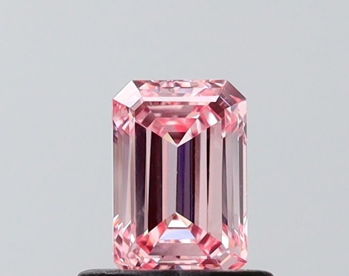 Loose Diamond - EMERALD 0.69ct Fancy Vivid Pink VVS2: Loose Diamond - EMERALD 0.69ct Fancy Vivid Pink VVS2 Source: This is a real non-mined Diamond that has been grown in a lab Shape: EMERALD Carats: 0.69 Color: Fancy Vivid Pink Certification: NONE Video