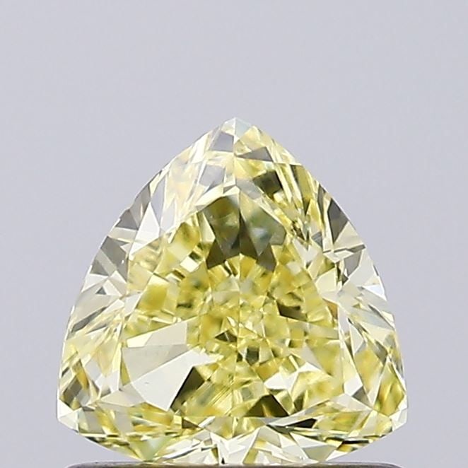 Loose Diamond - TRIANGULAR 0.7ct Fancy Yellow VS1: Loose Diamond - TRIANGULAR 0.7ct Fancy Yellow VS1 Source: This is a real non-mined Diamond that has been grown in a lab Shape: TRIANGULAR Carats: 0.7 Color: Fancy Yellow Certification: IGI Video:
