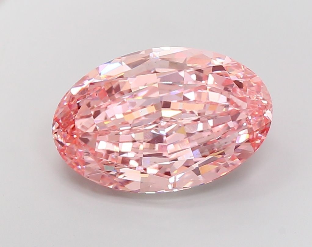 Loose Diamond - OVAL 15.14ct Fancy Vivid Pink VS1: Loose Diamond - OVAL 15.14ct Fancy Vivid Pink VS1 Source: This is a real non-mined Diamond that has been grown in a lab Shape: OVAL Carats: 15.14 Color: Fancy Vivid Pink Certification: IGI Video: