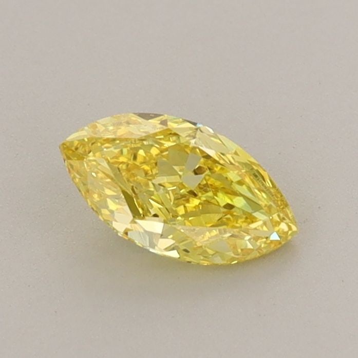 Loose Diamond - MARQUISE 0.48ct Fancy Vivid Yellow VVS2: Loose Diamond - MARQUISE 0.48ct Fancy Vivid Yellow VVS2 Source: This is a real non-mined Diamond that has been grown in a lab Shape: MARQUISE Carats: 0.48 Color: Fancy Vivid Yellow Certification: IGI 