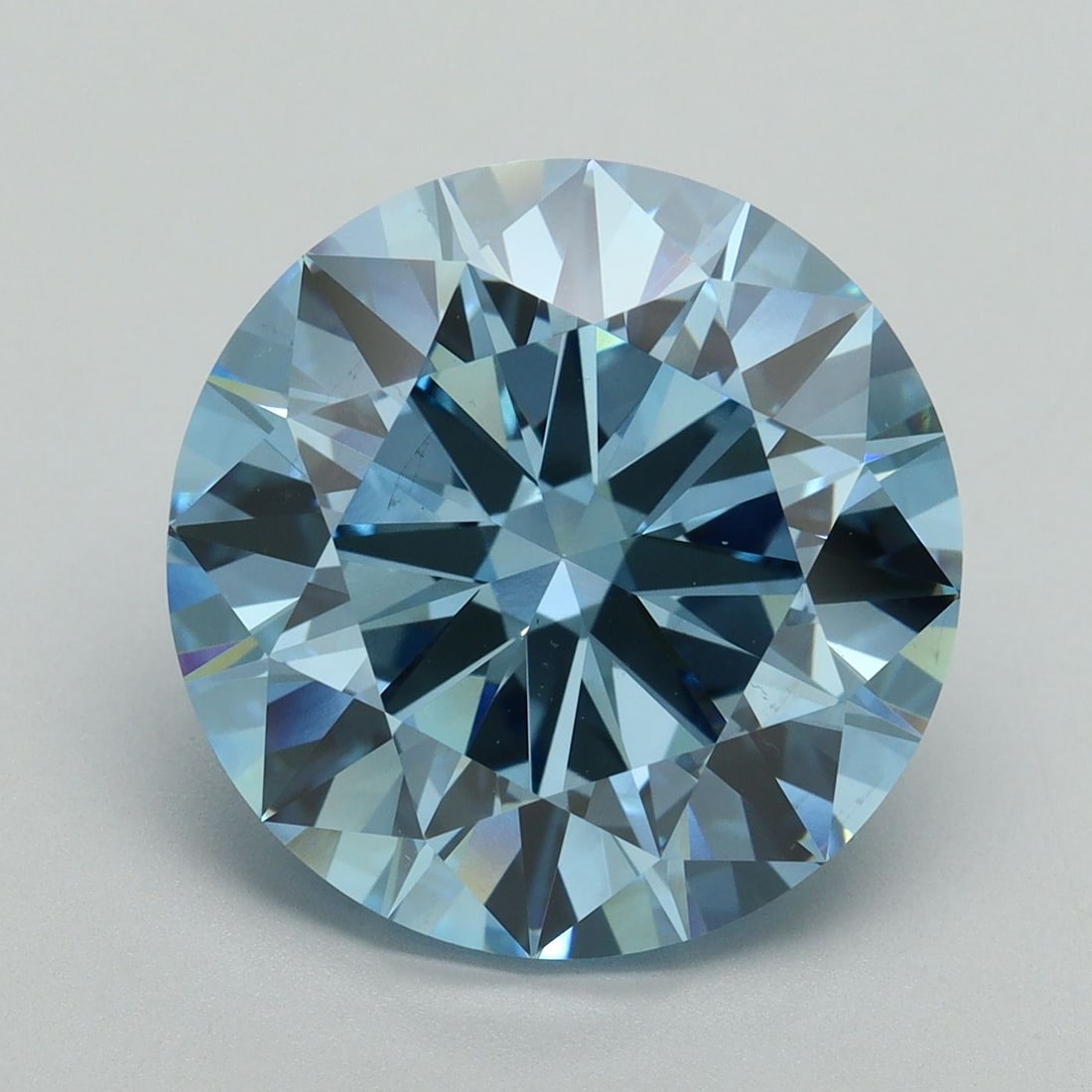 Loose Diamond - ROUND 9.01ct Fancy Vivid Blue VS2: Loose Diamond - ROUND 9.01ct Fancy Vivid Blue VS2 Source: This is a real non-mined Diamond that has been grown in a lab Shape: ROUND Carats: 9.01 Color: Fancy Vivid Blue Certification: IGI Video: