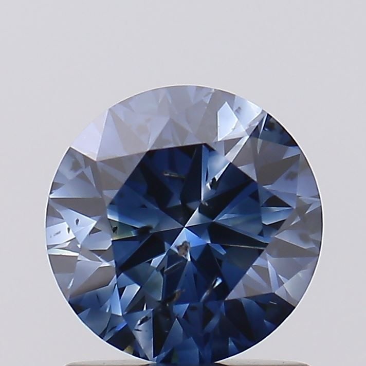 Loose Diamond - ROUND 1.12ct Fancy Vivid Blue I2: Loose Diamond - ROUND 1.12ct Fancy Vivid Blue I2 Source: This is a real non-mined Diamond that has been grown in a lab Shape: ROUND Carats: 1.12 Color: Fancy Vivid Blue Certification: NONE Video: