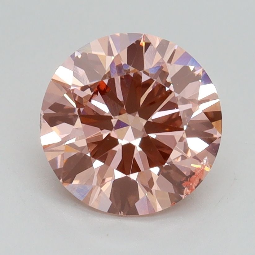 Loose Diamond - ROUND 1.71ct Fancy Intense Pink SI2: Loose Diamond - ROUND 1.71ct Fancy Intense Pink SI2 Source: This is a real non-mined Diamond that has been grown in a lab Shape: ROUND Carats: 1.71 Color: Fancy Intense Pink Certification: IGI Video: