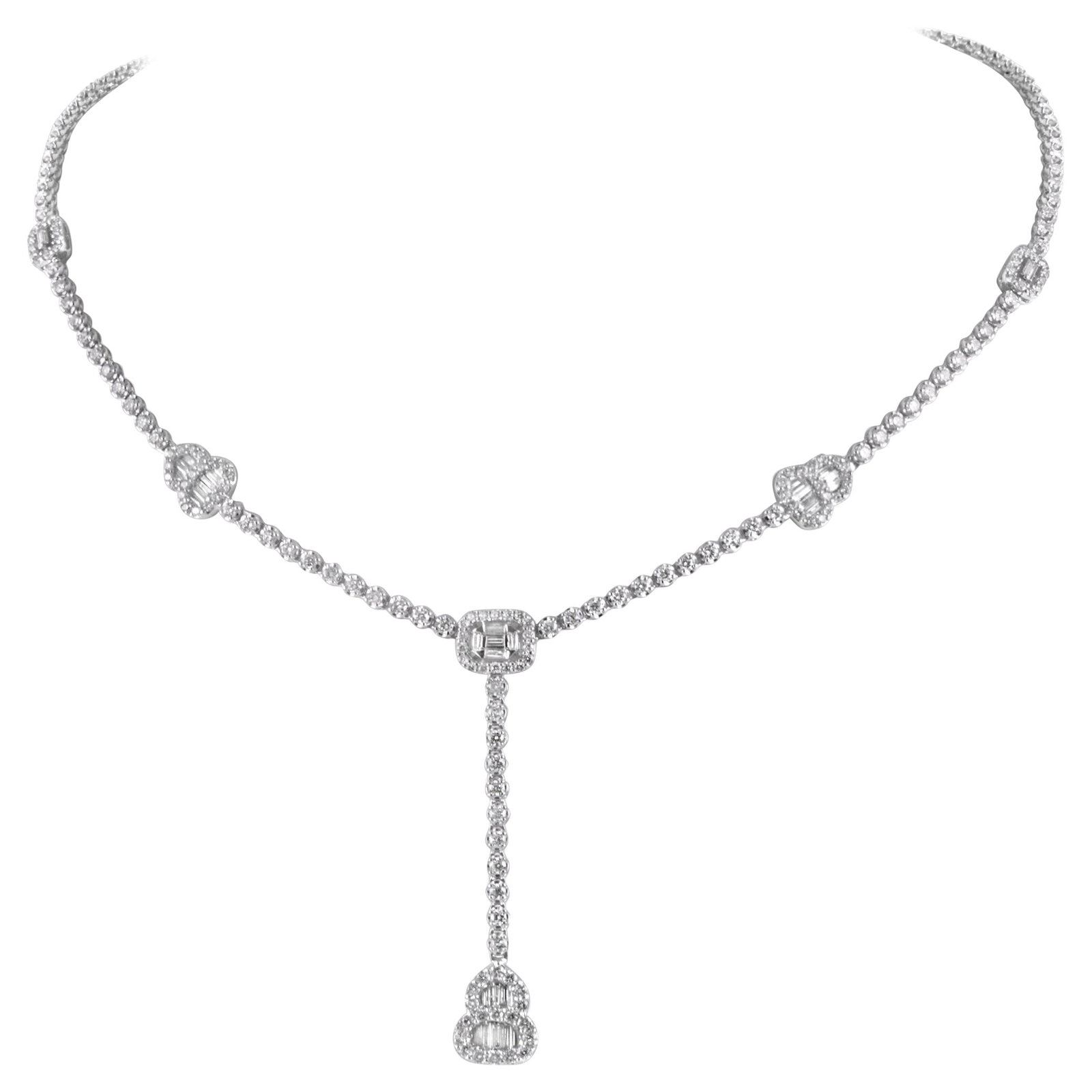 6.02ct Diamond Drop Necklace 18k White Gold: 6.02ct Diamond Drop Necklace 18k White Gold This stunning 6.02ct Illusion Set Diamond Drop Necklace is crafted from luxurious 18k white gold. It features an exquisite arrangement of 267 round and bagu
