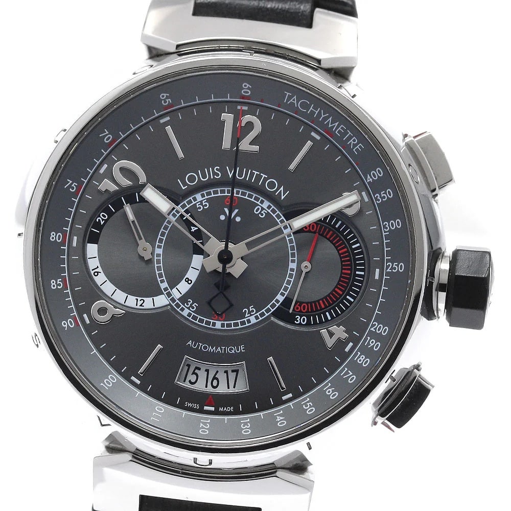 Louis Vuitton Tambour Voyage Q102N Slate Grey Dial Leather Strap Papers: Louis Vuitton Tambour Voyage Q102N Slate Grey Dial Leather Strap Papers This Louis Vuitton Tambour Voyage watch features a slate grey dial paired with a fixed bezel and a leather strap. The timepiece 