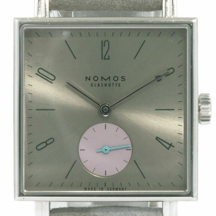 NOMOS Glashutte Tetra Allure NM477 29.5mm Manual Wind Watch: NOMOS Glashutte Tetra Allure NM477 29.5mm Manual Wind Watch Pre-owned NOMOS Glashutte Tetra Allure women's wristwatch, model NM477, with a 29.5 mm square case. It features a silver stainless steel cas