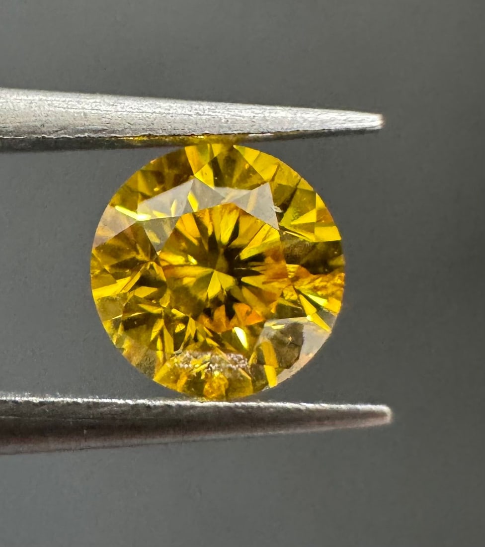 Loose Diamond - ROUND 0.27ct Fancy Vivid Orangey Yellow I2: Loose Diamond - ROUND 0.27ct Fancy Vivid Orangey Yellow I2 Source: Natural Shape: ROUND Carats: 0.27 Color: Fancy Vivid Orangey Yellow Certification: GIA PLEASE NOTE: Framed, Large, or heavy items do 