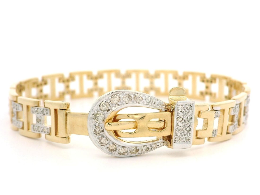 18k Yellow White Gold Diamond H Link Buckle Bracelet 0.80ctw: 18k Yellow White Gold Diamond H Link Buckle Bracelet 0.80ctw This exquisite bracelet features a polished buckle design made from 18K solid yellow gold, complemented by white gold accents. Adorned with